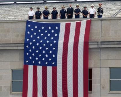 display of the American flag, at dedication of September 11th memorial, Pentagon,  2008.
